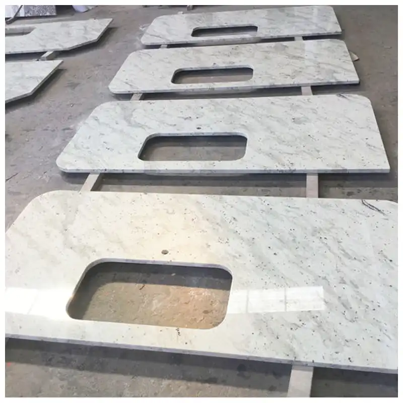 Taulells de granit blanc colonial